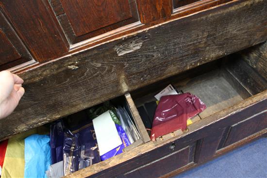 An 18th century oak box seat settle, W.3ft 9in.